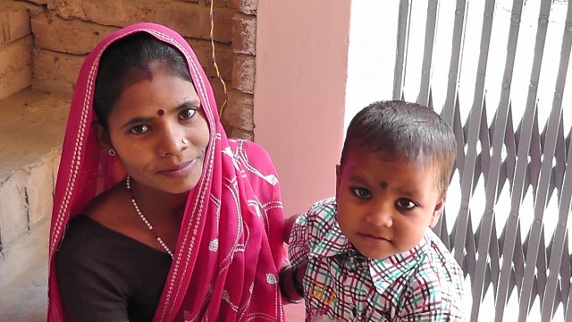 village boy with mom